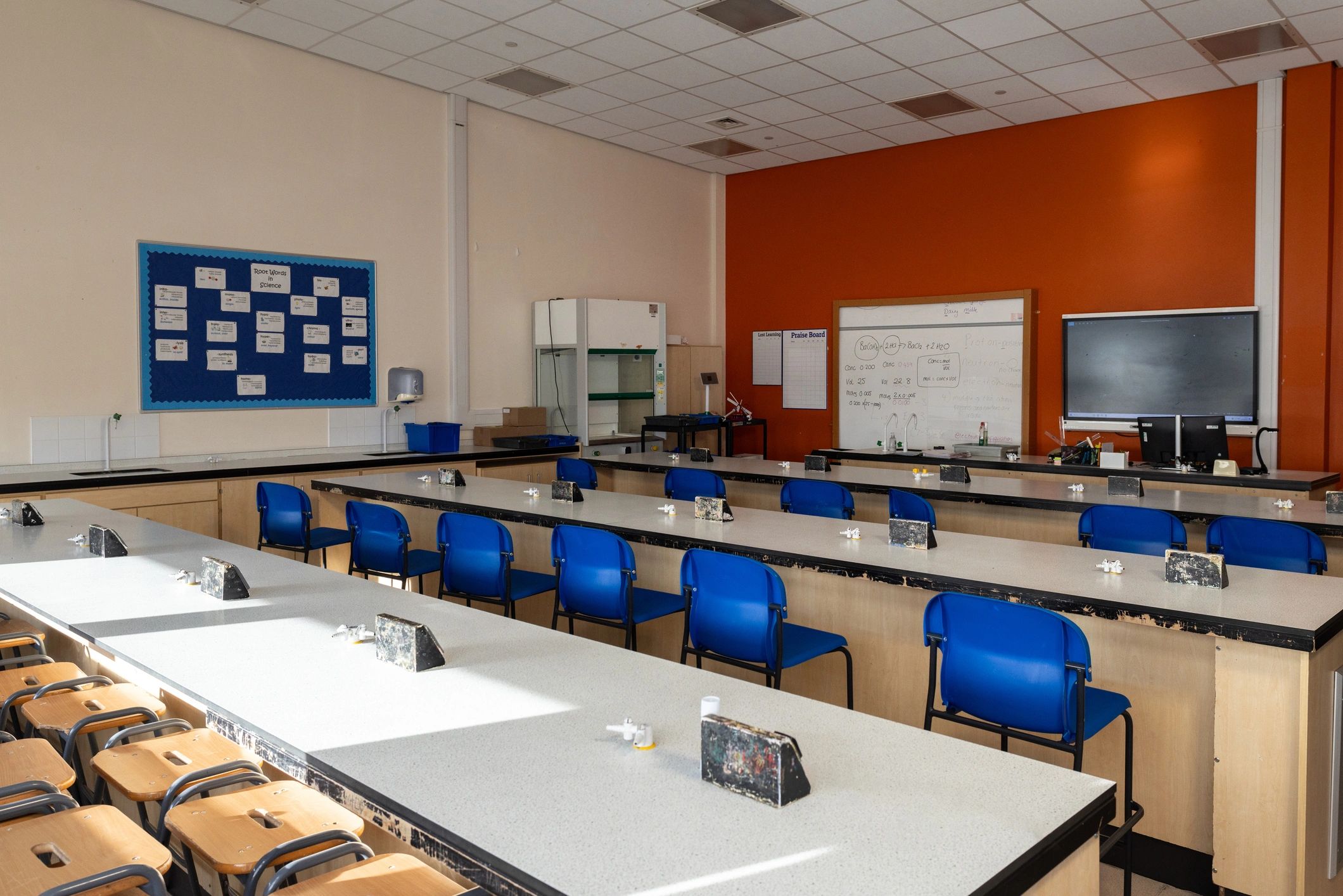 Modern laboratory workspace with benches and equipment